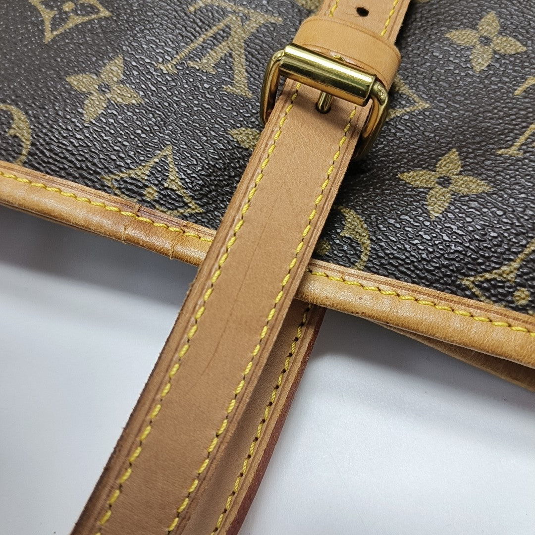 BUCKET GM Monogram Coated Canvas Brown
