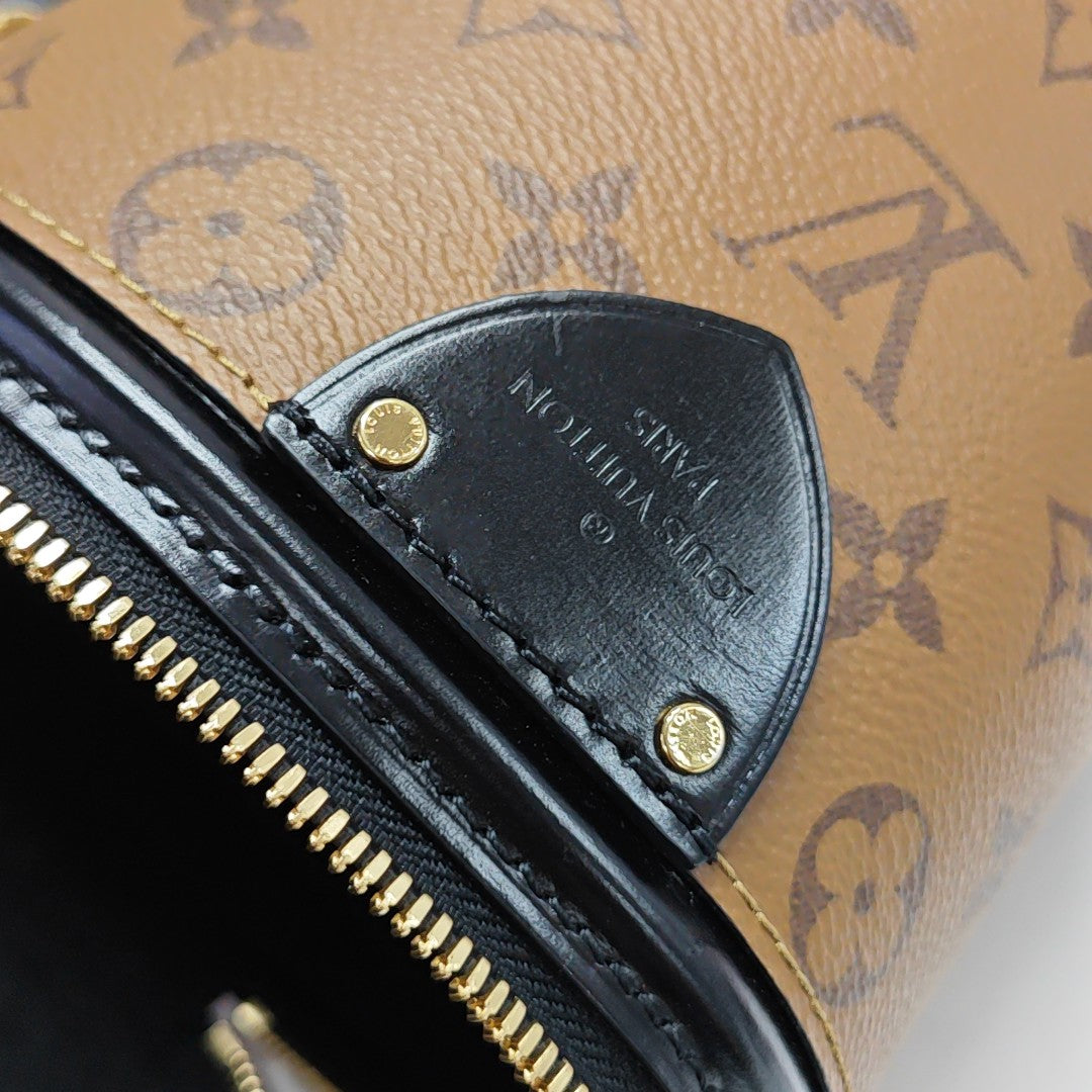 CANNES PM Monogram Coated Canvas Brown