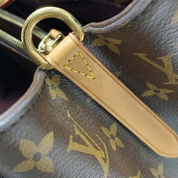 MONTAIGNE GM Monogram Coated Canvas Brown
