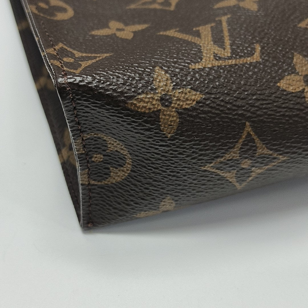 TOILET POCKET 26 Monogram Coated Canvas Brown