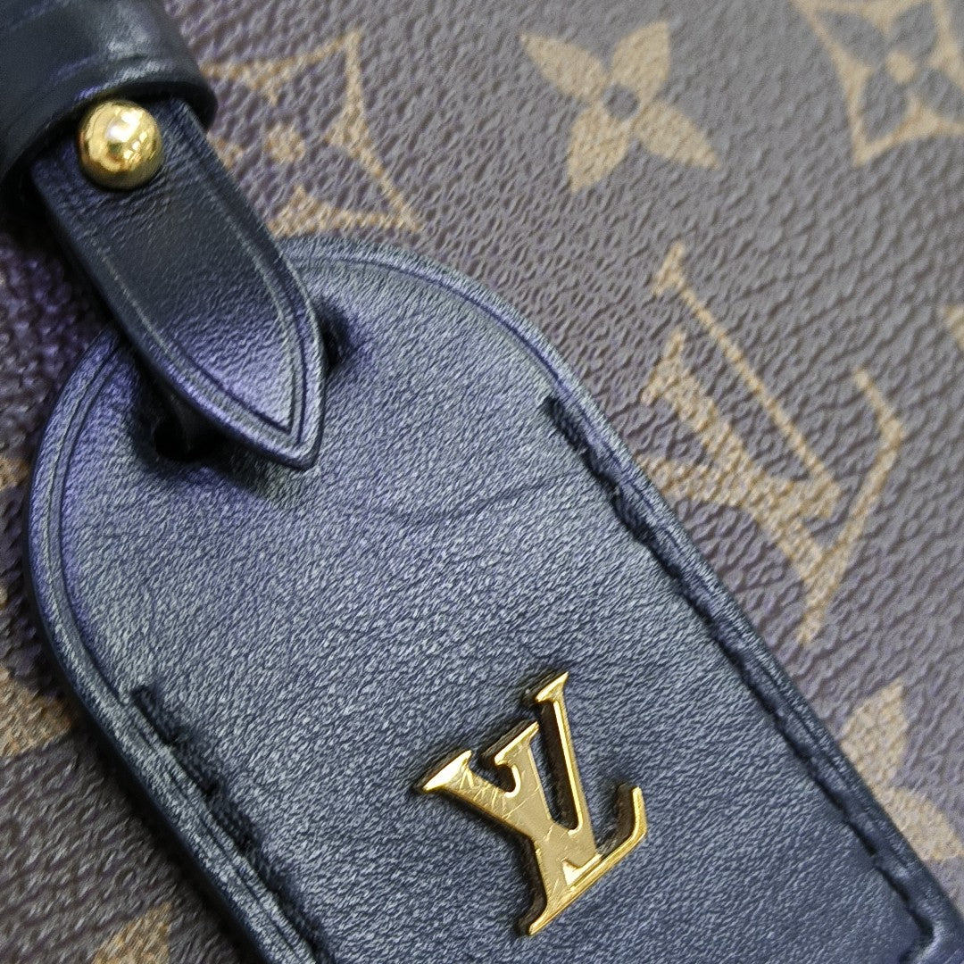 PETITE MALLE Monogram Coated Canvas Brown