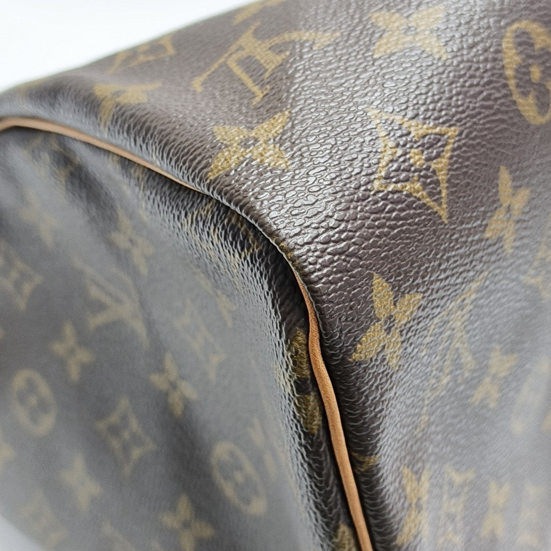 SPEEDY 30 Monogram Coated Canvas Brown