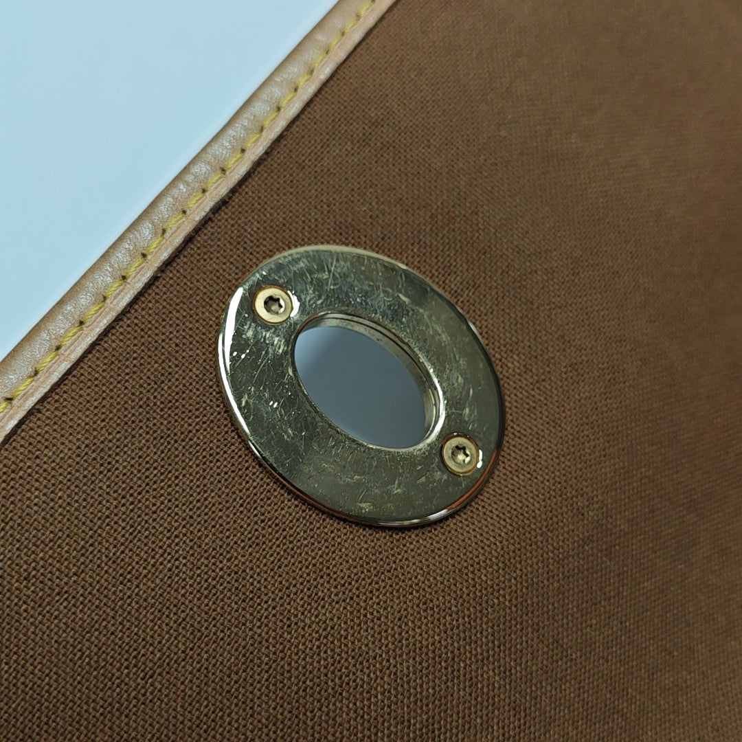 TIKAL Monogram Coated Canvas Brown