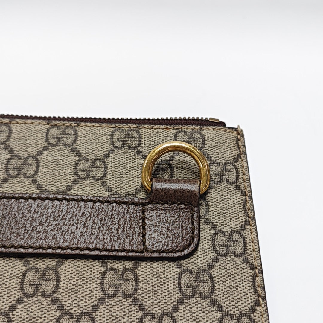 Monogram Coated Canvas Clutch Beige