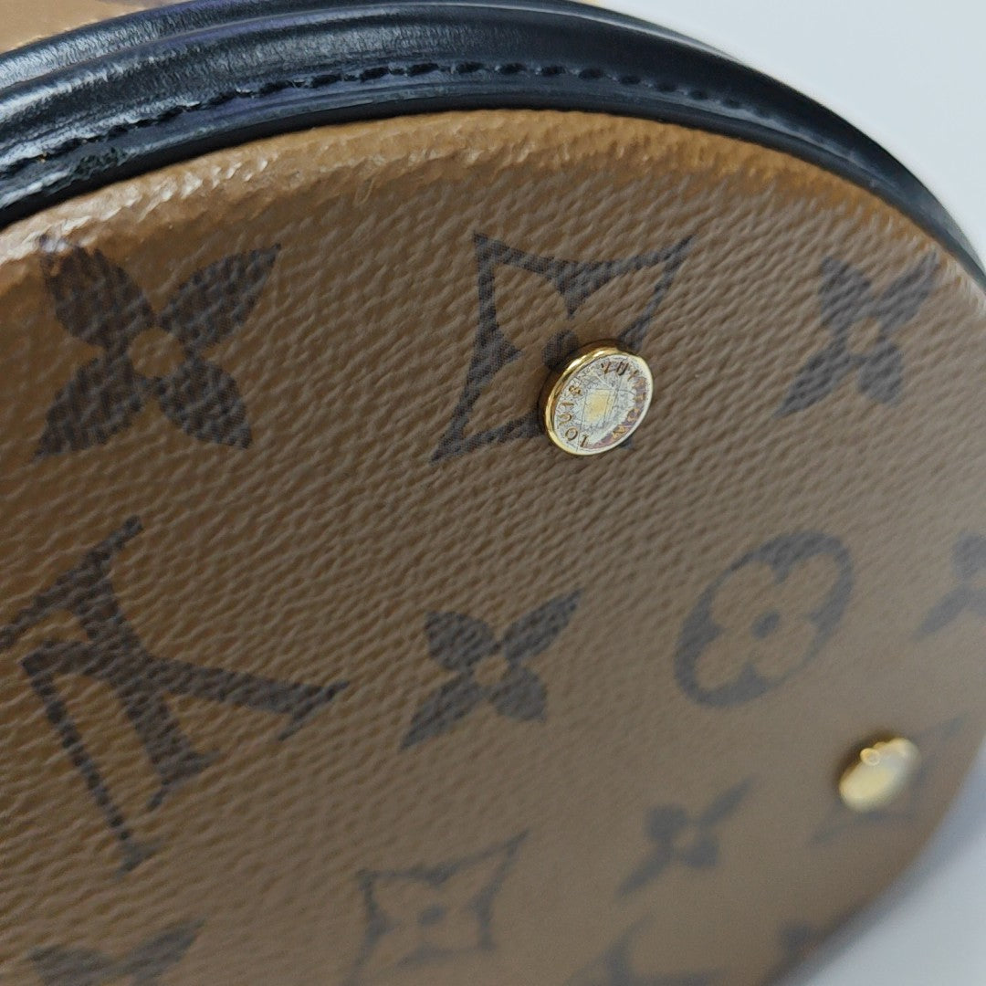 CANNES PM Monogram Coated Canvas Brown