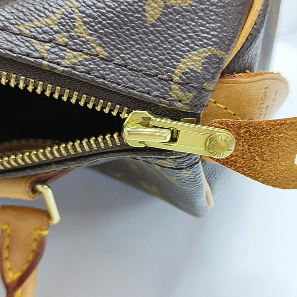 SPEEDY 25 Monogram Coated Canvas Brown