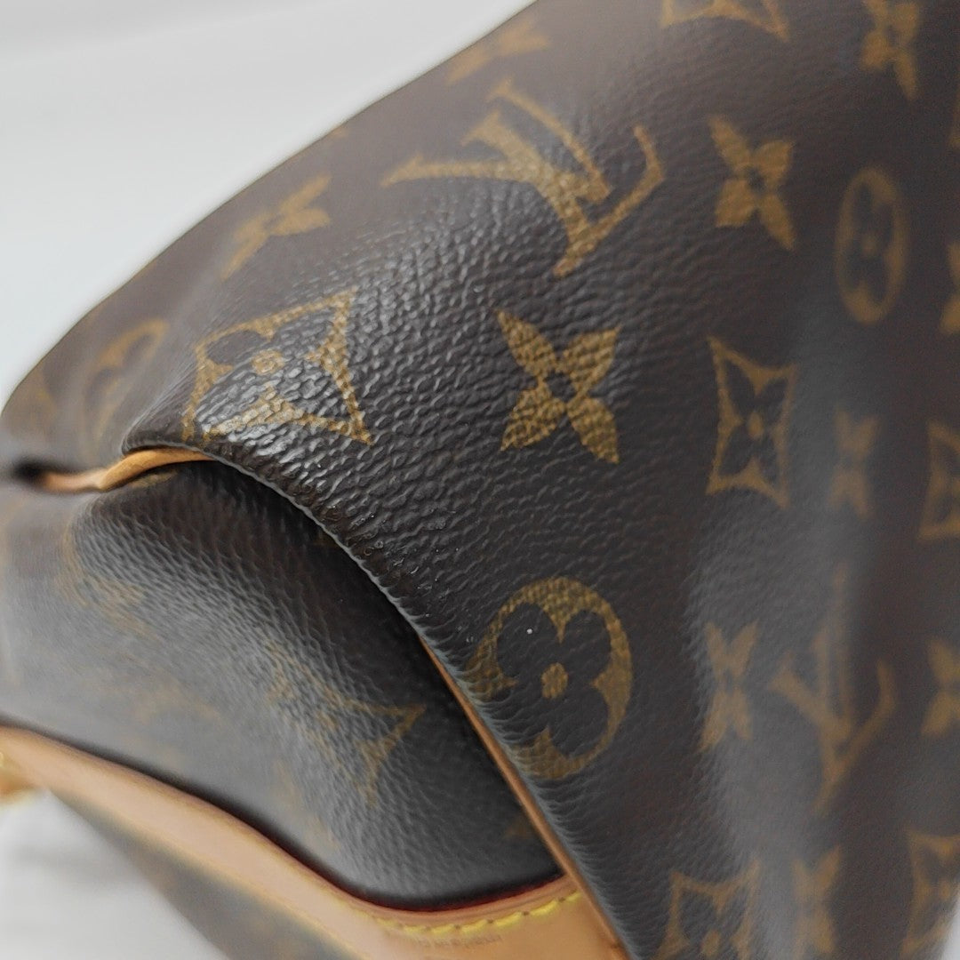 SPEEDY 25 Monogram Coated Canvas Brown