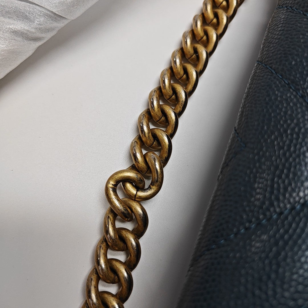 Authenticated pre-owned  BOY CHANEL Medium Chevron, Quilted Grained Calfskin Blue - Shoulder Bag at Looply