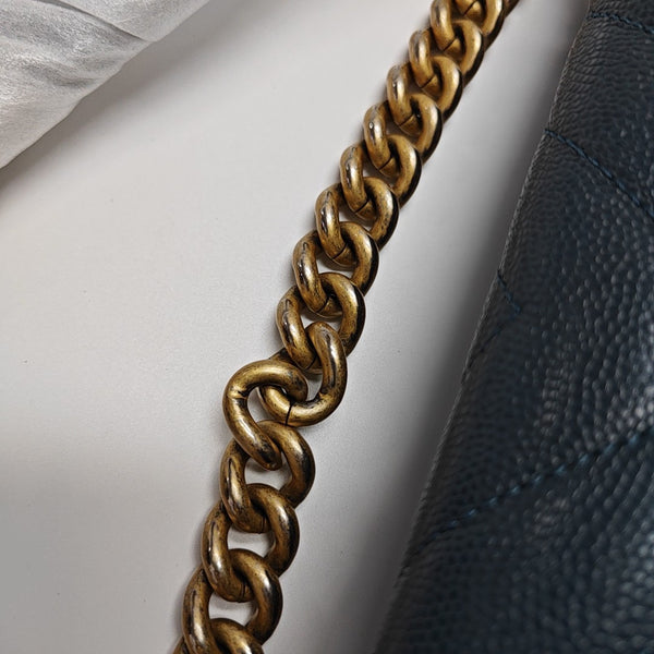 Authenticated pre-owned  BOY CHANEL Medium Chevron, Quilted Grained Calfskin Blue - Shoulder Bag at Looply