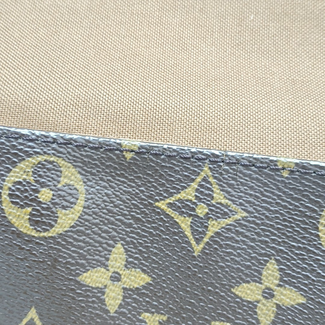 LOOPING PM Monogram Coated Canvas Brown