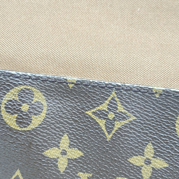 LOOPING PM Monogram Coated Canvas Brown
