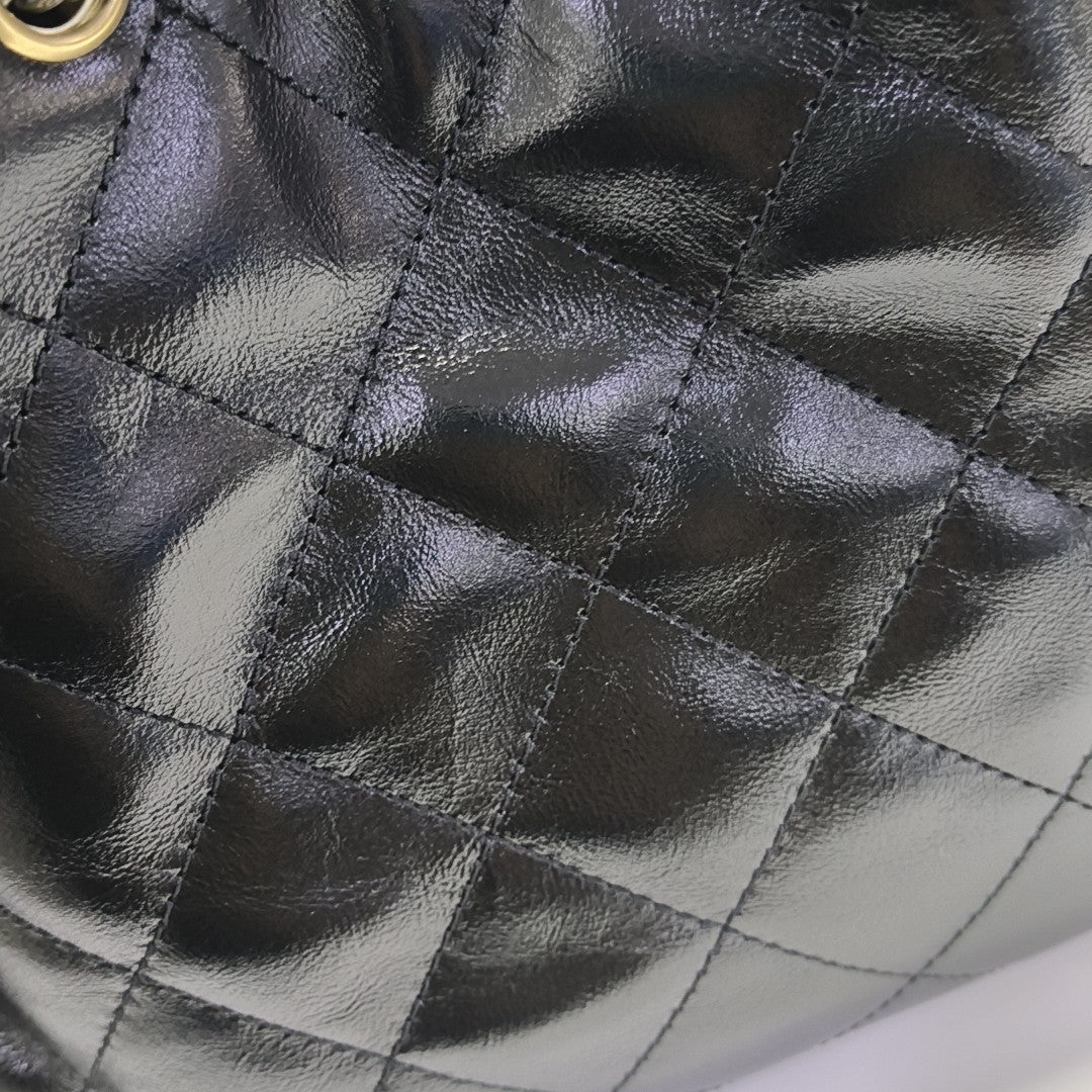 CHANEL 25 Small Quilted Waxed Cafskin Black