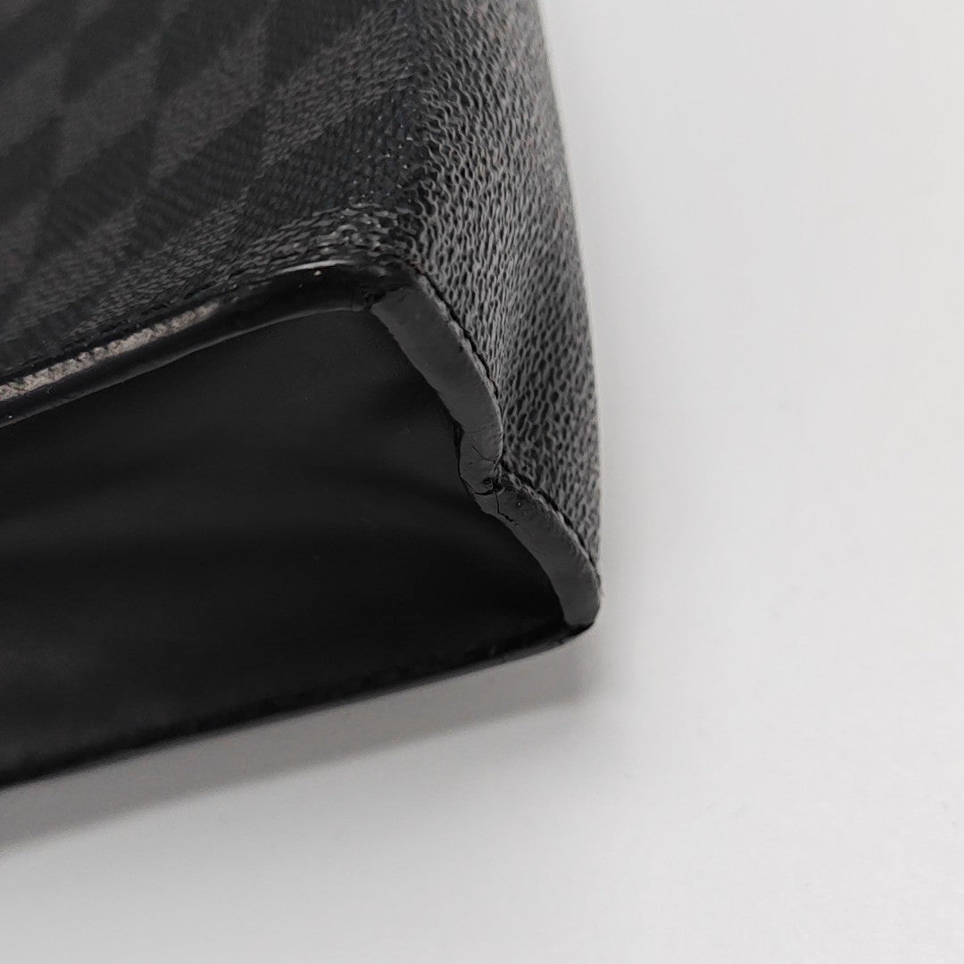 Pochette Voyag MM Monogram Coated Canvas Black
