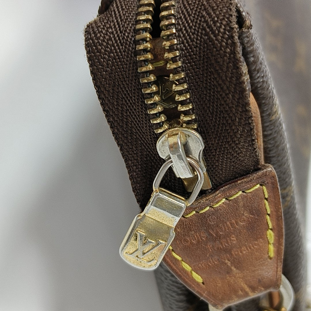 Pochette Eva Monogram Coated Canvas Brown
