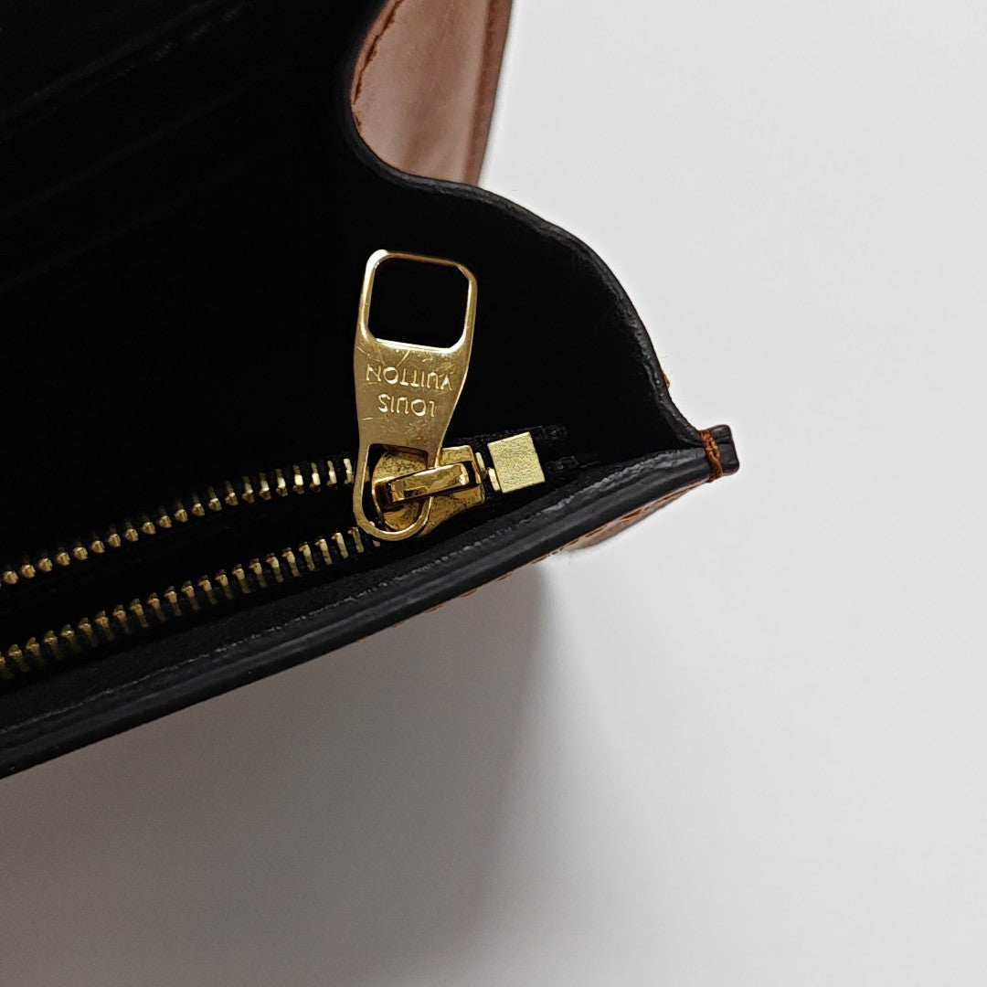 DAUPHINE Monogram Coated Canvas Brown