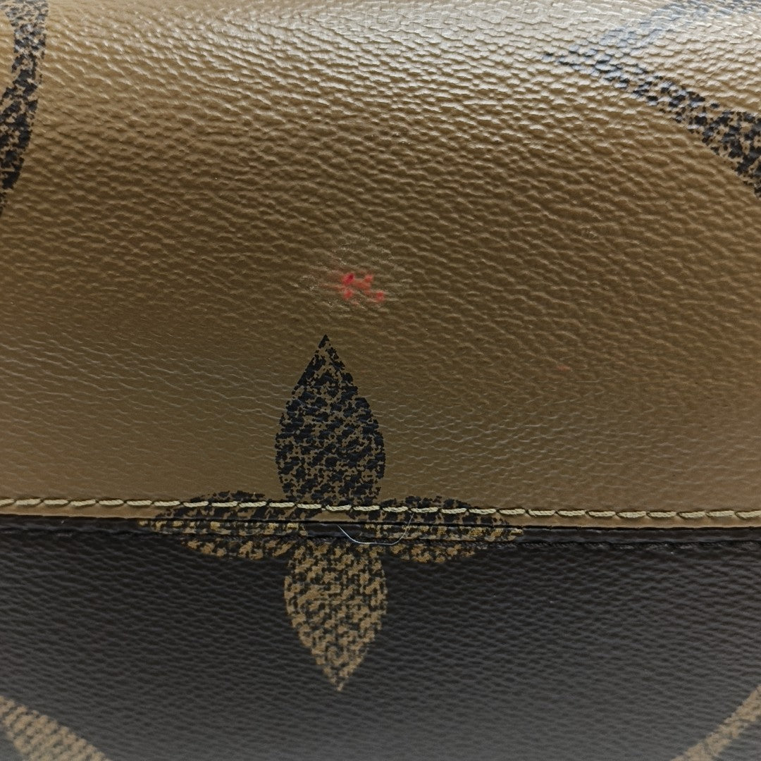ONTHEGO MM Monogram Coated Canvas Brown