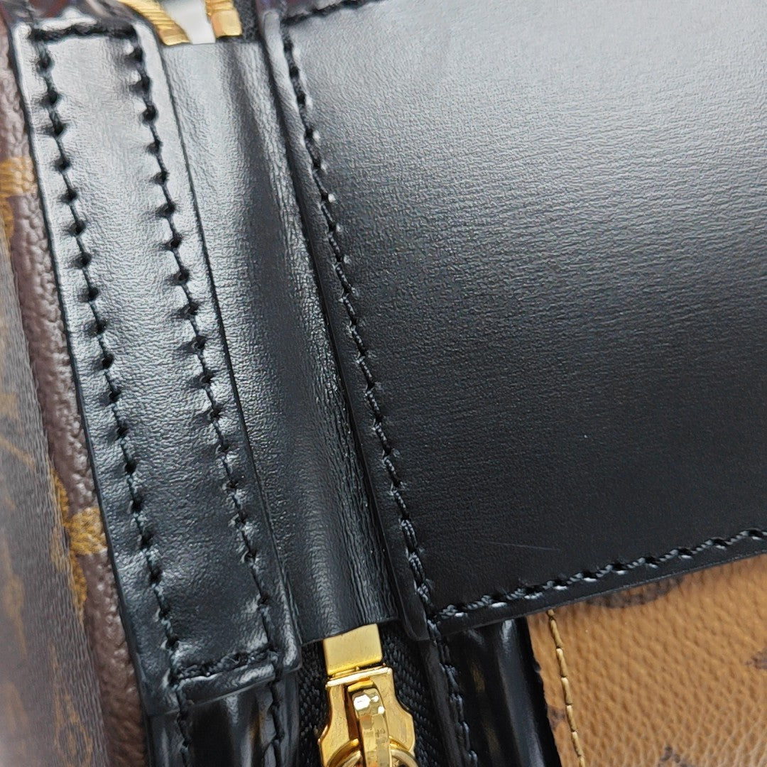CANNES PM Monogram Coated Canvas Brown