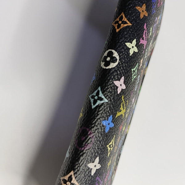 Cartera negra Insolite Monogram de lona revestida