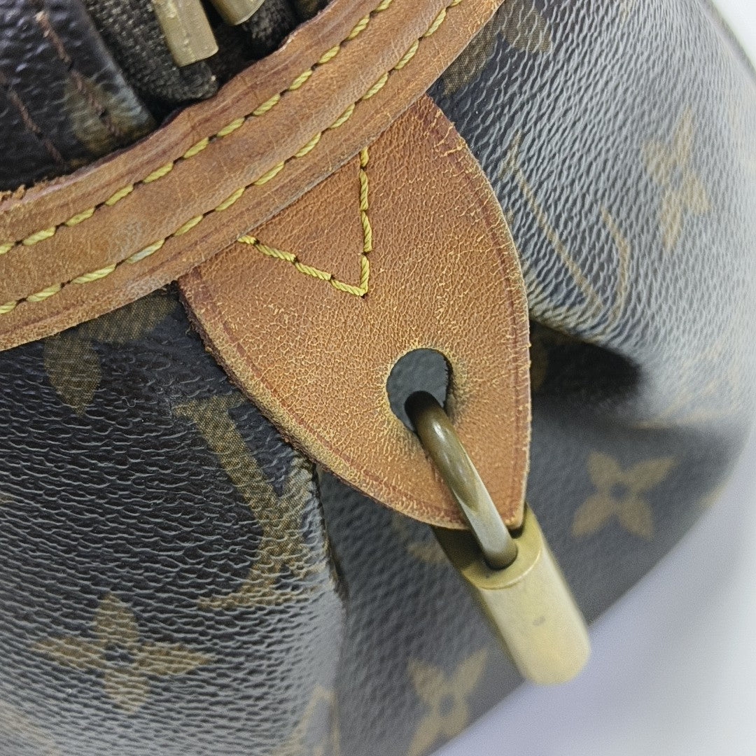 MONTORGUEI Monogram Coated Canvas Brown