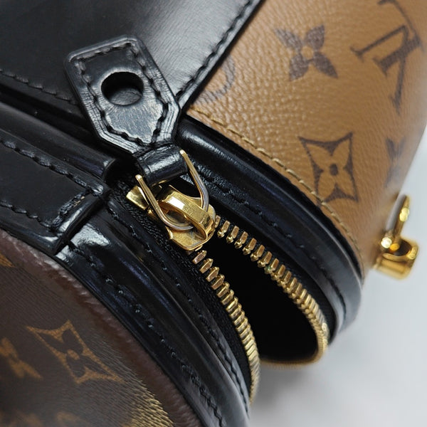 CANNES PM Monogram Coated Canvas Brown