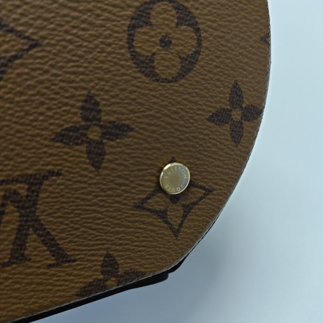 CANNES PM Monogram Coated Canvas Brown