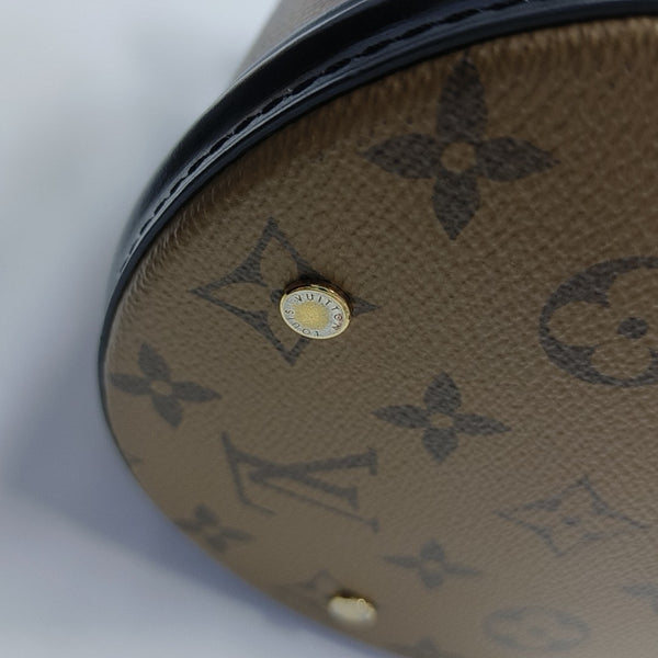 CANNES PM Monogram Coated Canvas Brown