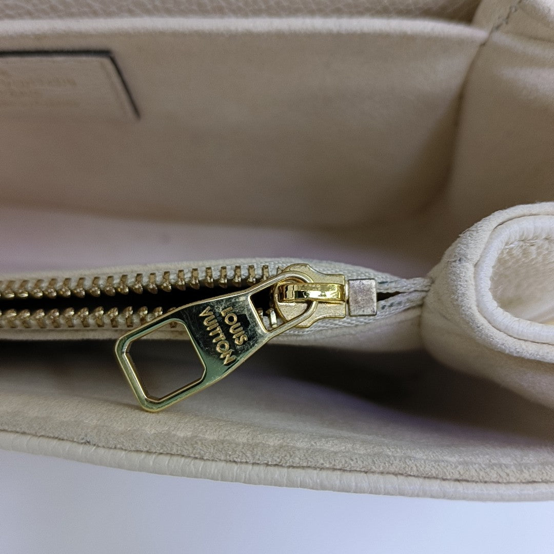MÉTIS EAST WEST Monogram Calfskin Beige