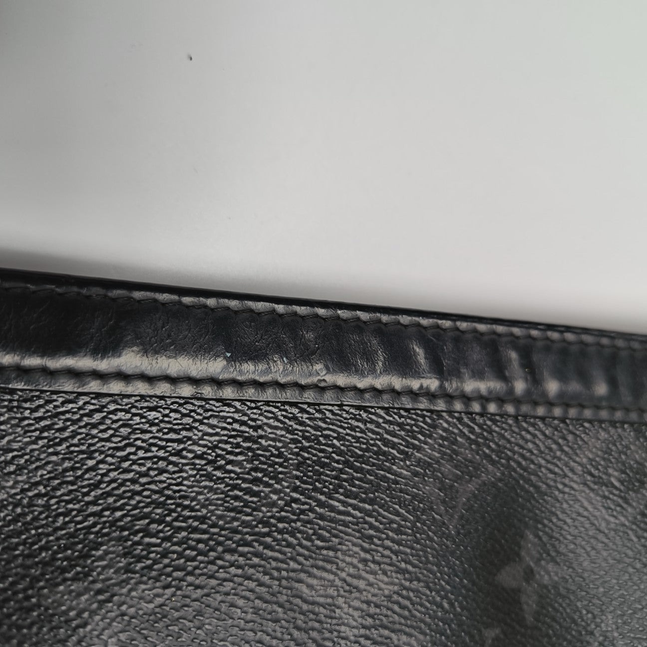 Pochette Voyag MM Monogram Coated Canvas Black