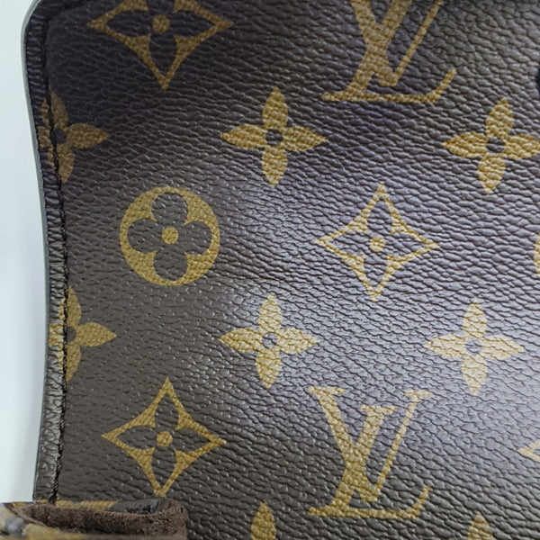 MÉTIS EAST WEST Monogram Coated Canvas Brown
