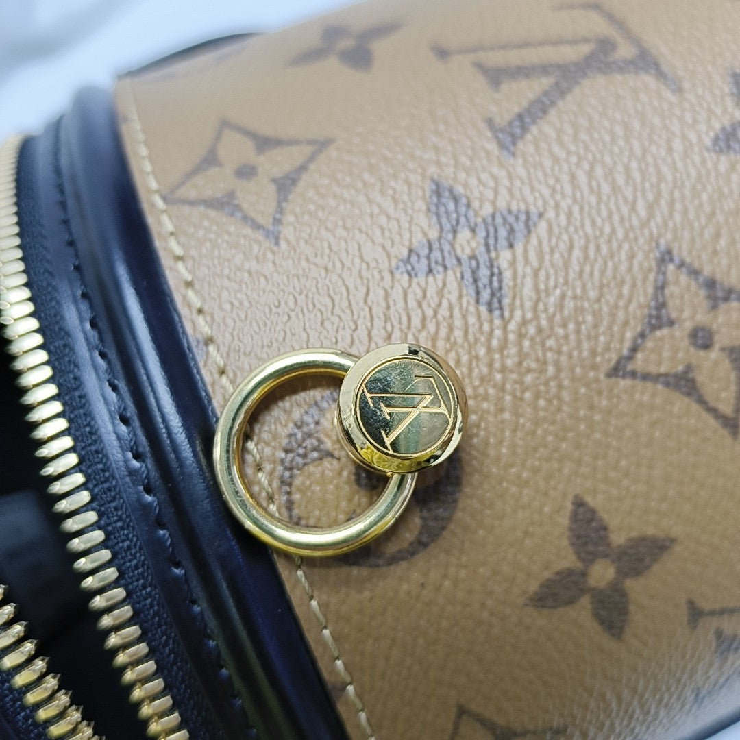 CANNES PM Monogram Coated Canvas Brown