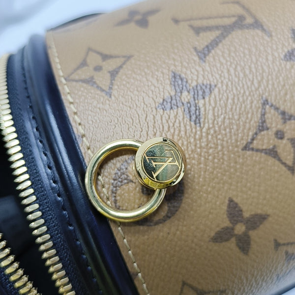 CANNES PM Monogram Coated Canvas Brown