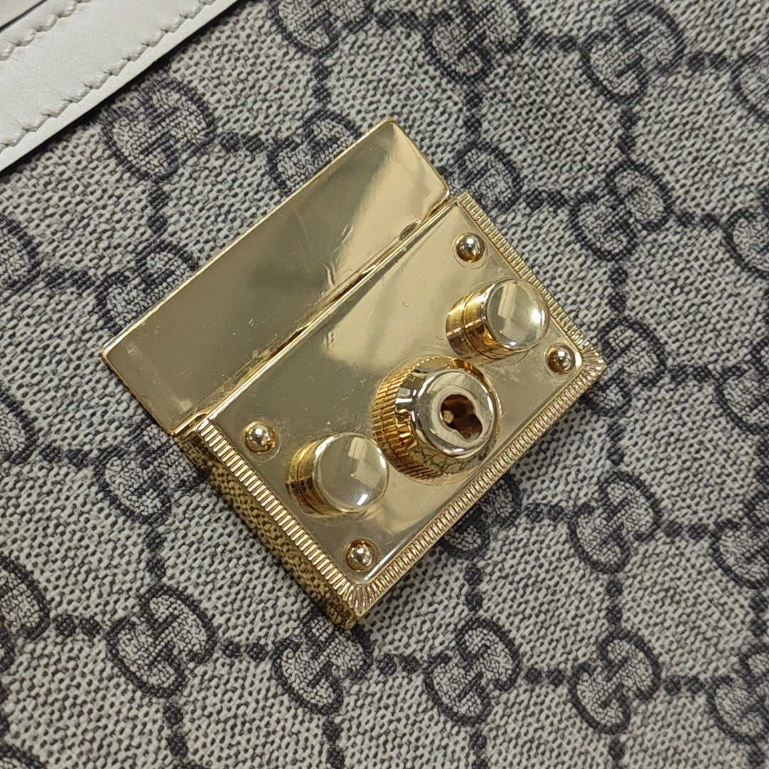 Padlock Small Monogram Coated Canvas Beige
