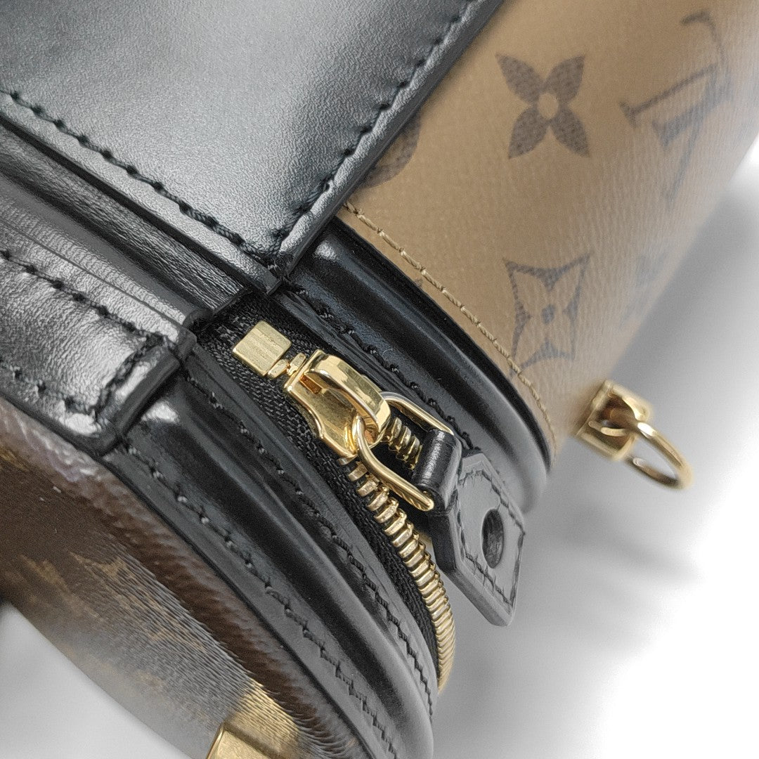 CANNES PM Monogram Coated Canvas Brown