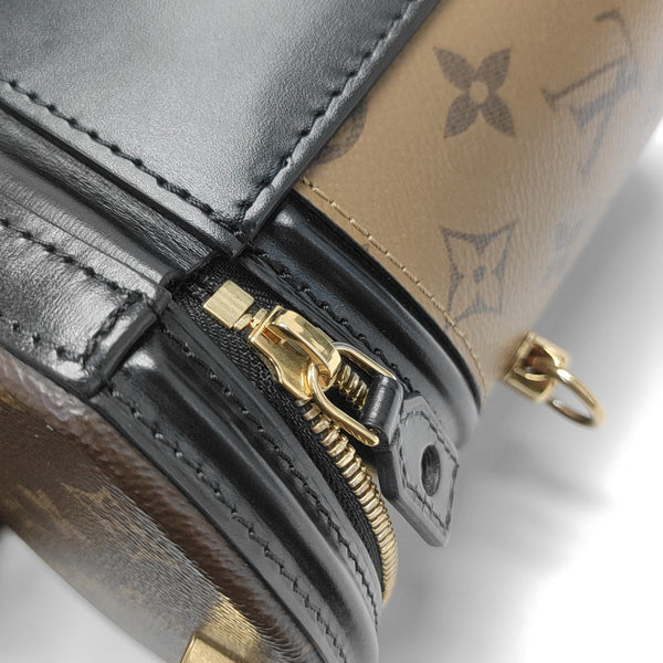 CANNES PM Monogram Coated Canvas Brown