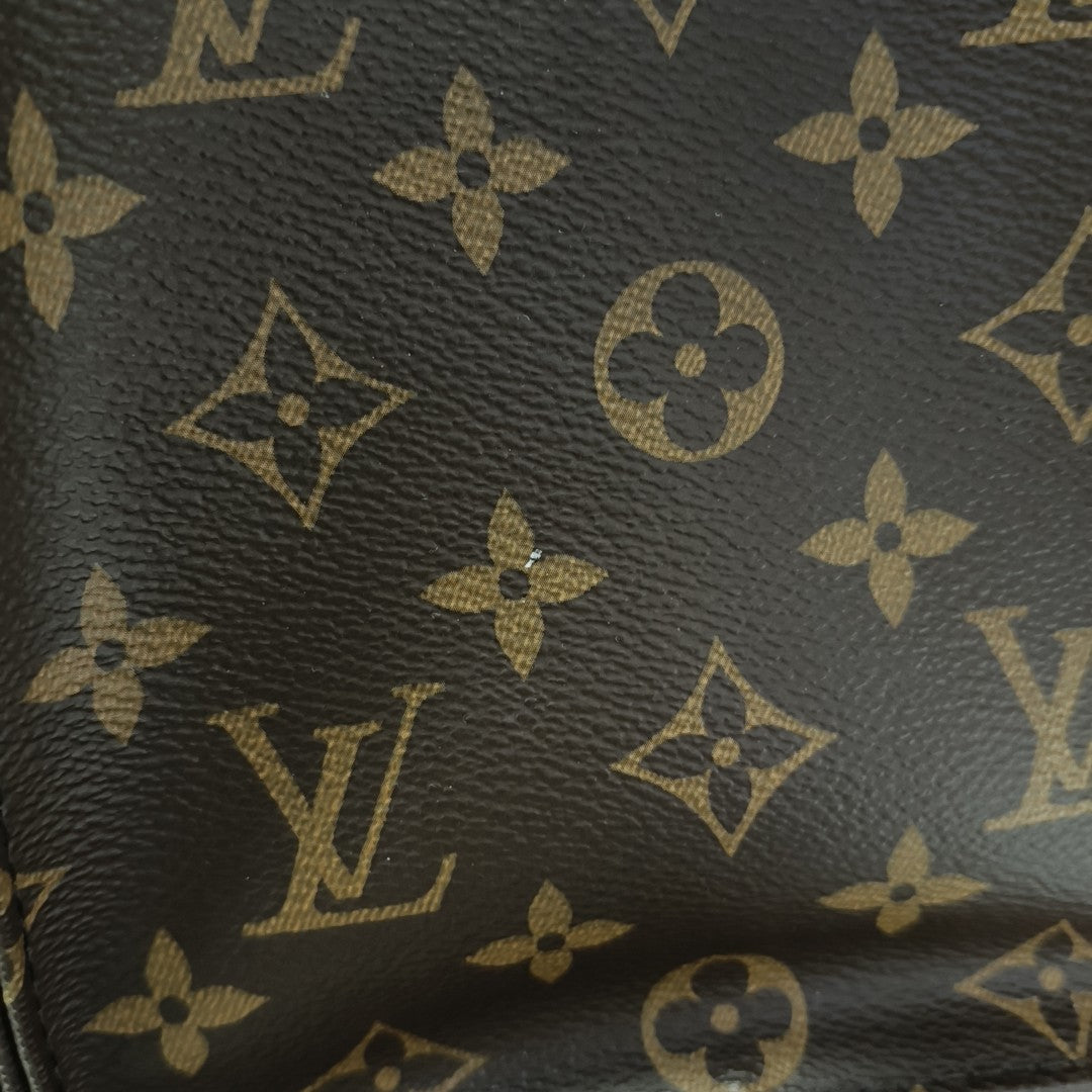 ONTHEGO MM Monogram Coated Canvas Brown
