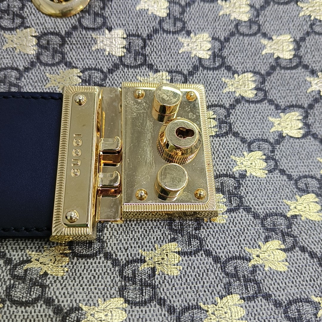 Padlock Small Monogram Coated Canvas Beige