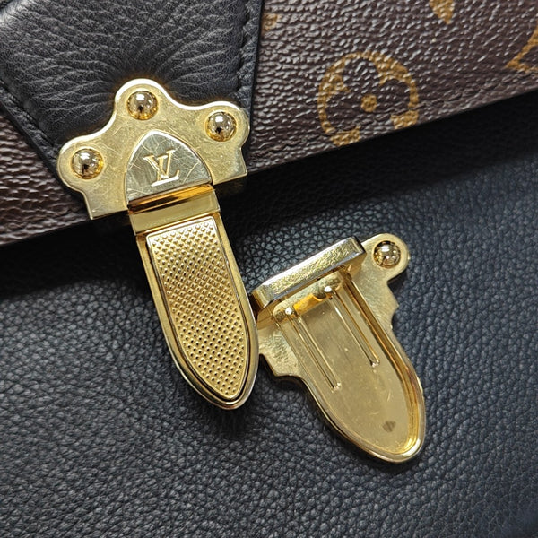 VICTOIRE Monogram Coated Canvas Brown