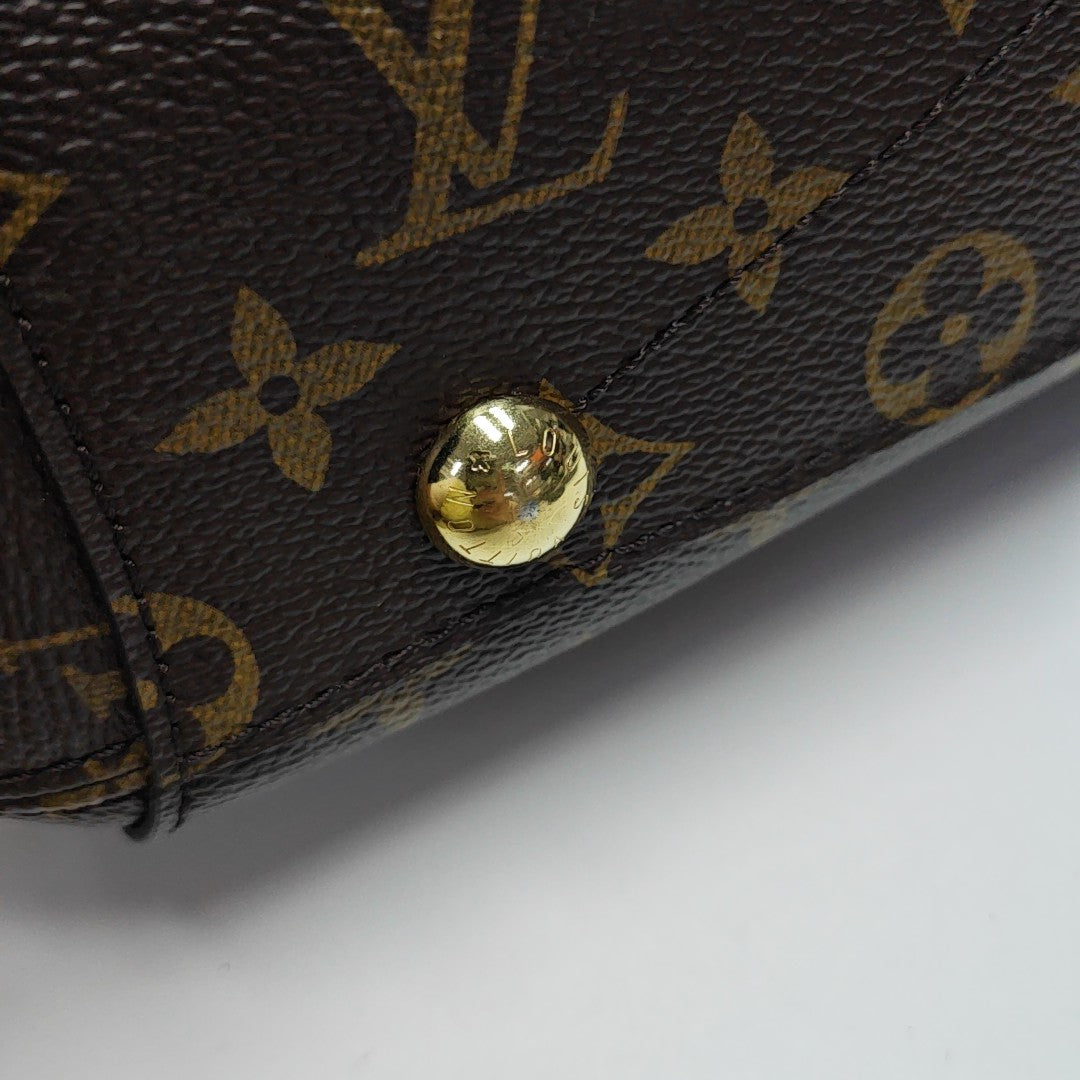 MONTAIGNE Monogram Coated Canvas Brown