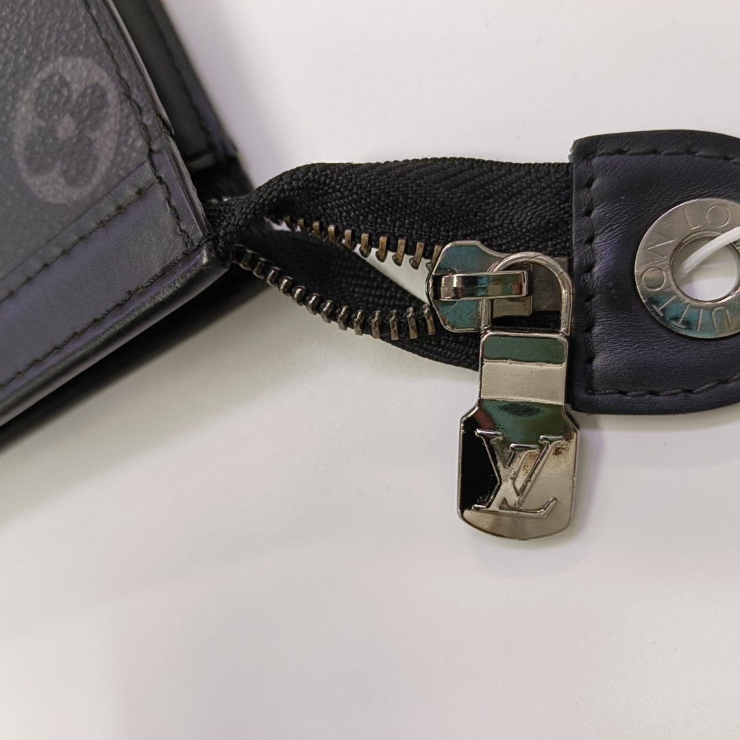 Pochette Voyag MM Monogram Coated Canvas Black
