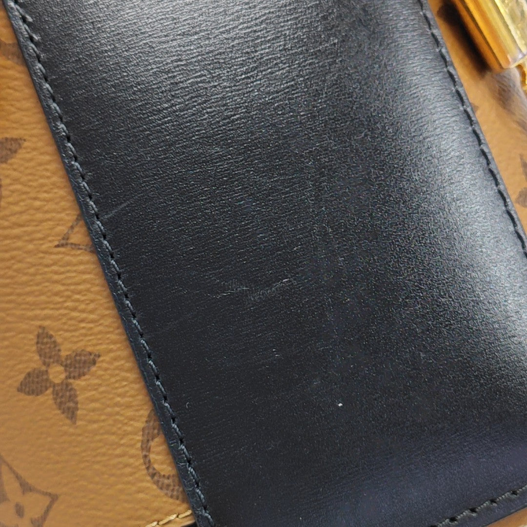 CANNES PM Monogram Coated Canvas Brown