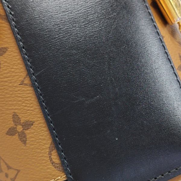 CANNES PM Monogram Coated Canvas Brown
