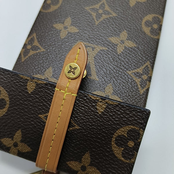Monogram Coated Canvas Clutch Brown