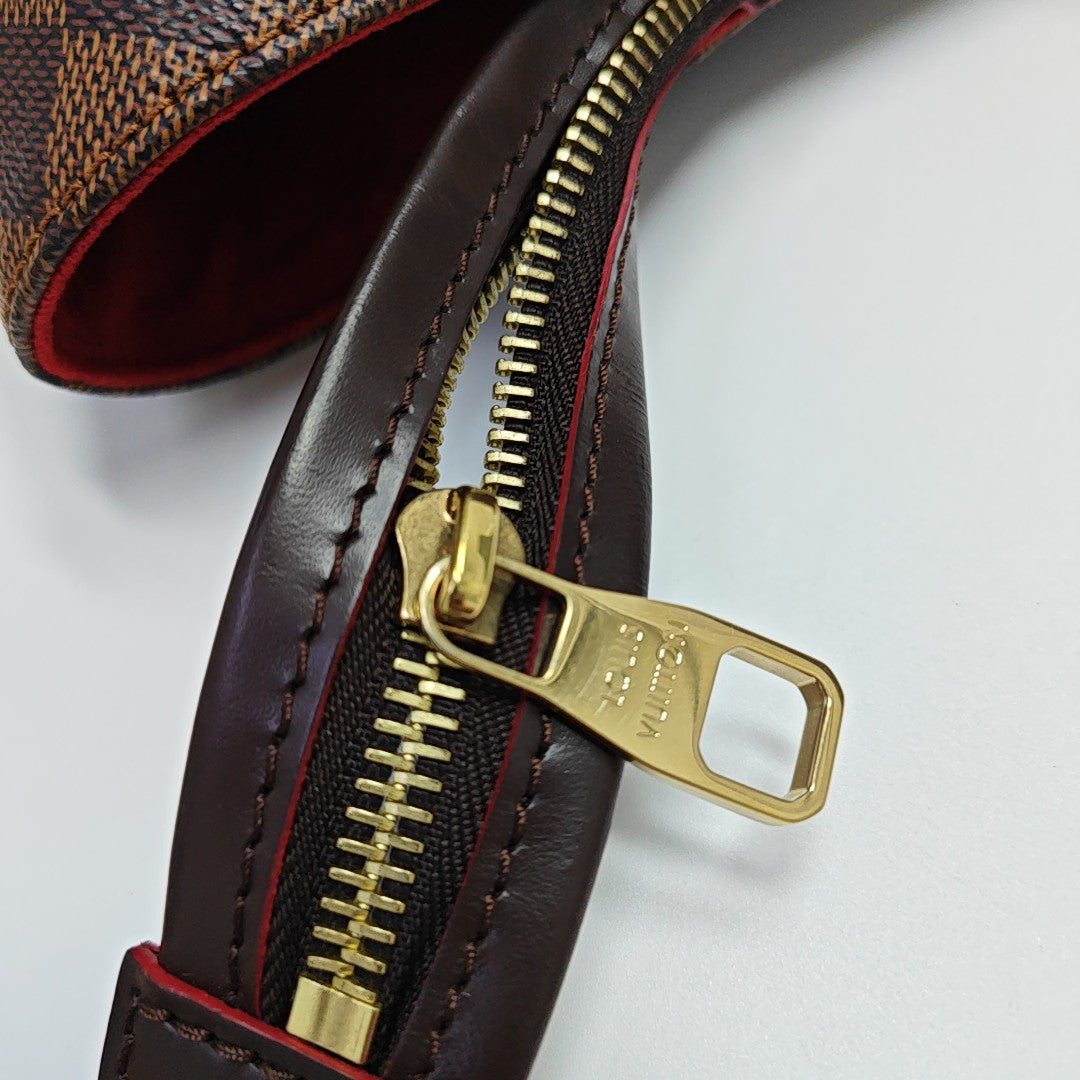 CAÏSSA MM Damier Ebene Coated Canvas Brown