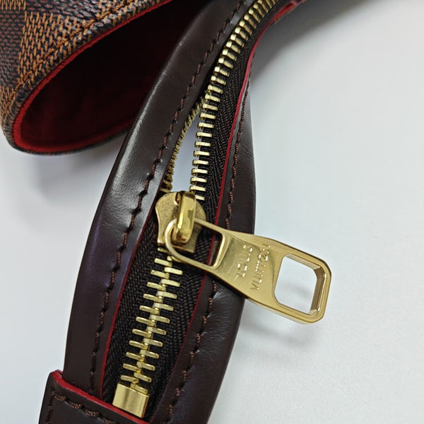 CAÏSSA MM Damier Ebene Coated Canvas Brown