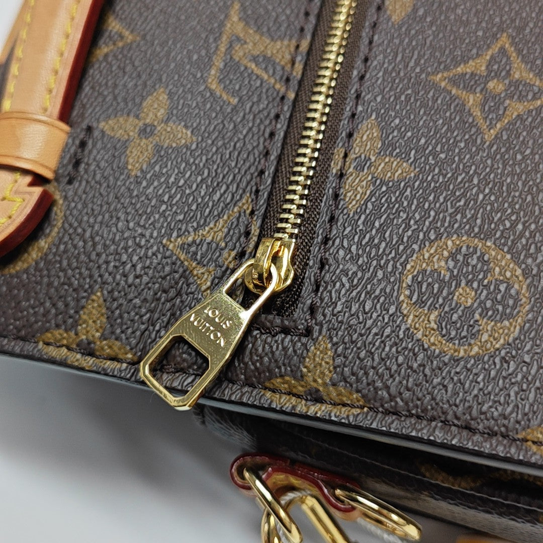 MÉTIS EAST WEST Monogram Coated Canvas Brown