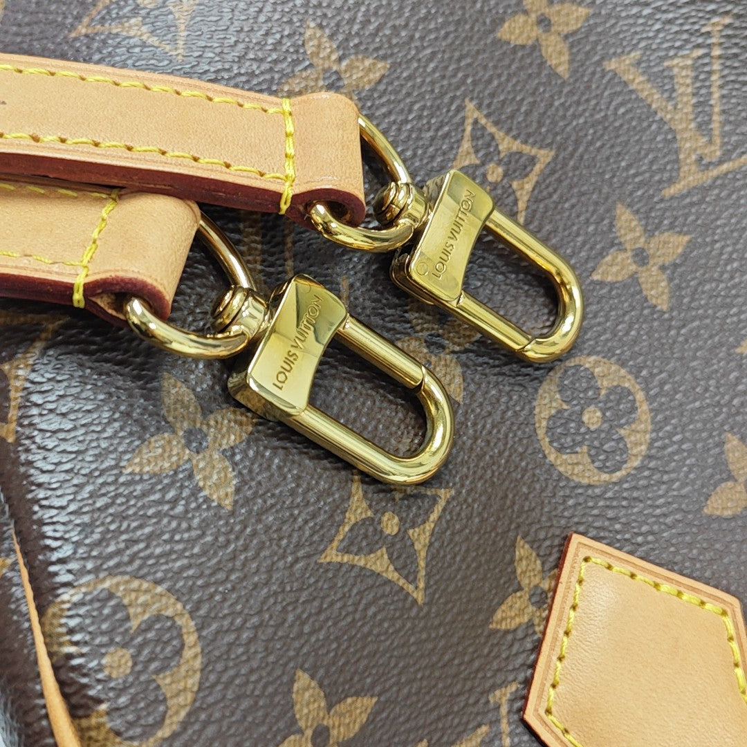 SPEEDY 25 Monogram Coated Canvas Brown