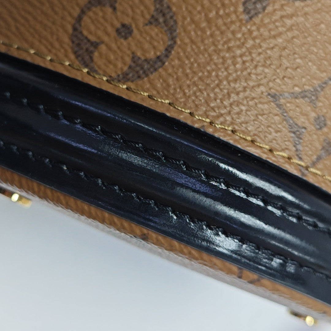CANNES PM Monogram Coated Canvas Brown