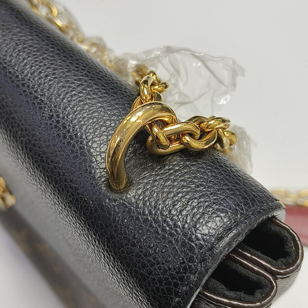 SAINT PLACIDE Monogram Coated Canvas Black