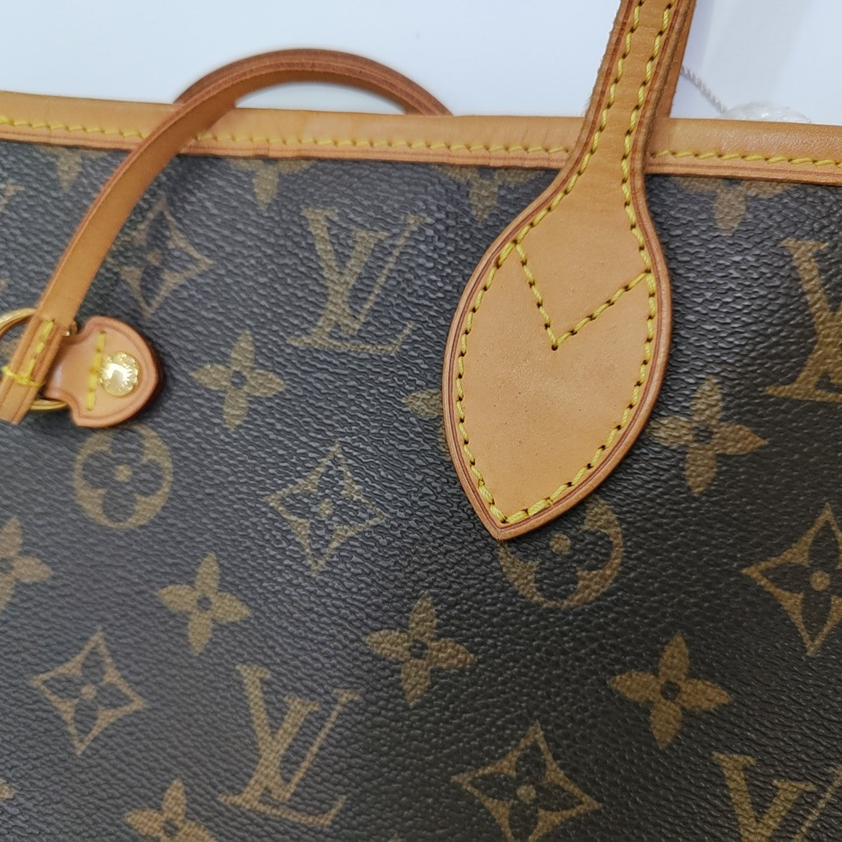 NEVERFULL MM Monogram Coated Canvas Brown