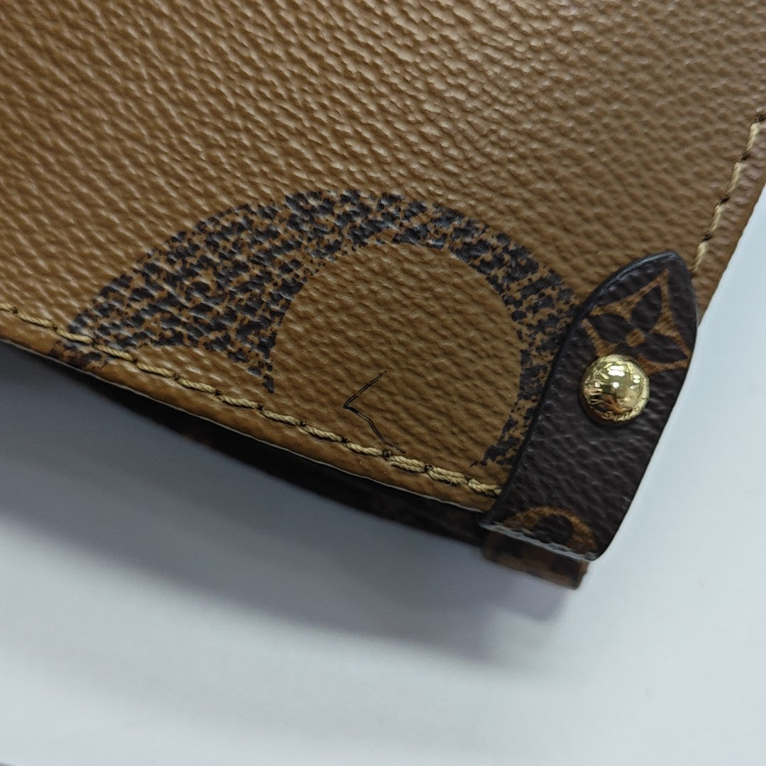 ONTHEGO MM Monogram Coated Canvas Brown